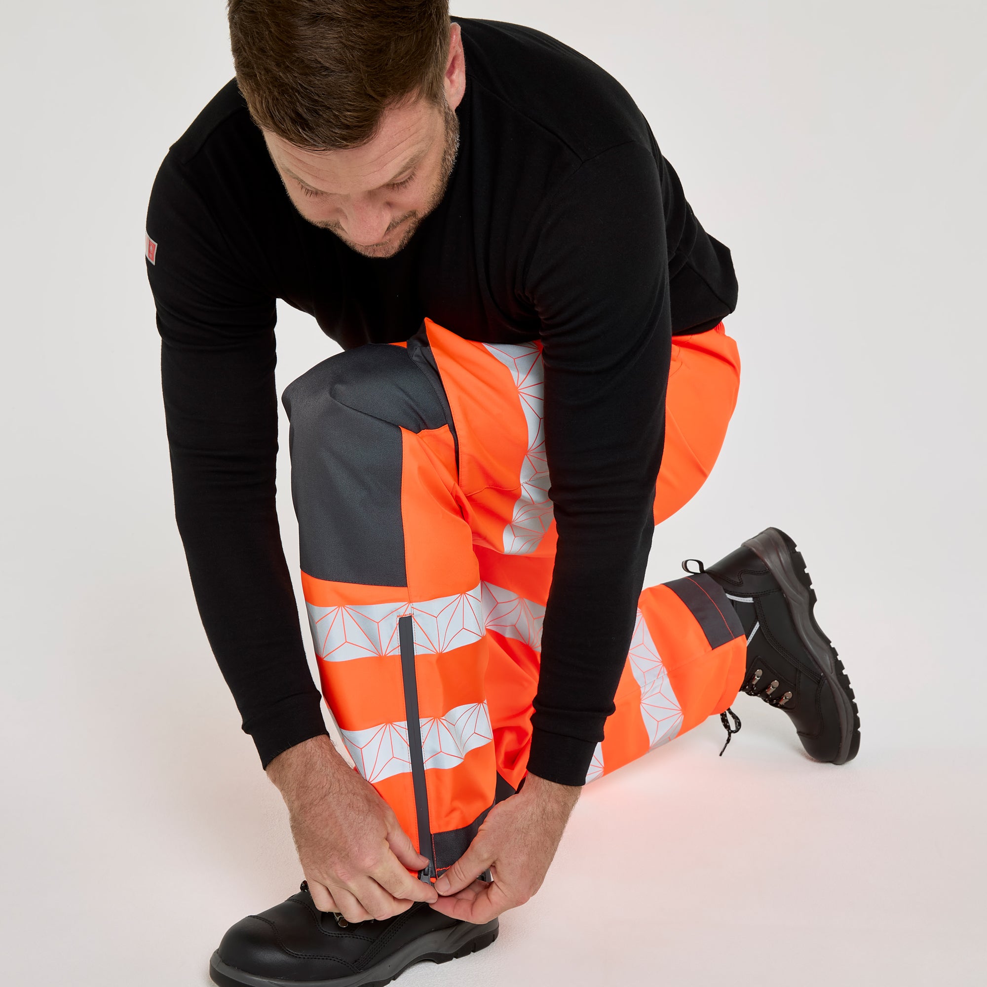 PULSAR® REACT Overtrousers Orange – High-Visibility Workwear | PULSAR®